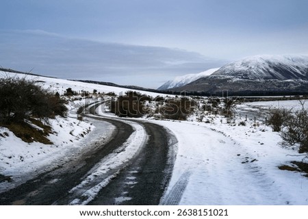 Winding road at Ashburton Lakes region in winter. Canterbury. New Zealand.