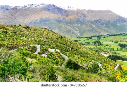 Winding road down from Crown Range, New Zealand