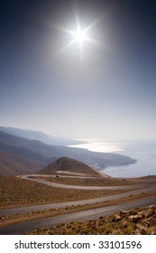 A Winding Road Down The Hill
