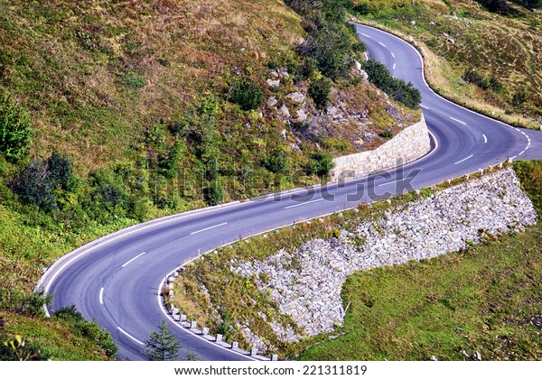 winding road at the european\
alps