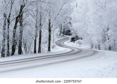 Winding road and frosty landscape