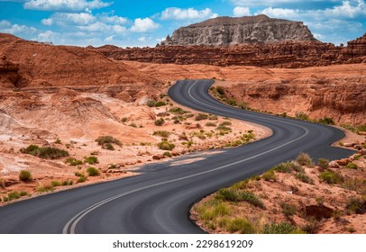 Winding road through the canyon desert. Canyon road in desert. Canyon desert road. Road in canyon desert - Powered by Shutterstock