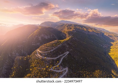 Winding road through forest Tazi Canyon Antalya, Turkey Aerial view top.
