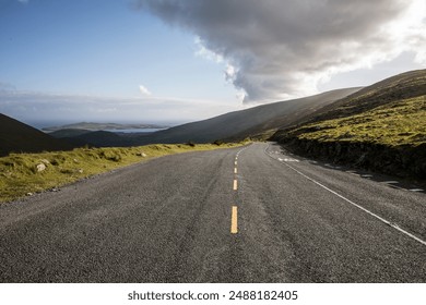 Winding Road Through Irish Mountains on a Cloudy Day - Powered by Shutterstock