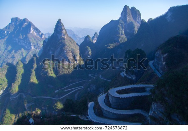 The winding road to Tianmen Mountain (Heavens Gate).\
Taken from the cable car gondola. - Zhangjiajie, Hunan Province,\
China - December 2016