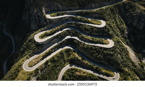 Winding Serra da Leba Road in Angola showcases dramatic landscapes and twisting turns - Powered by Shutterstock