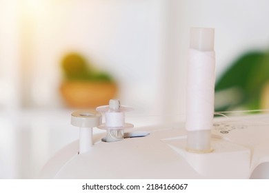 Winding Threads On A Bobbin On A Sewing Machine.