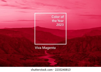 Winding turquoise Sulak River in crevice in mountains of Dagestan at summer sunset. Image toned in trendy pantone color of year 2023 Viva Magenta. - Shutterstock ID 2233240813