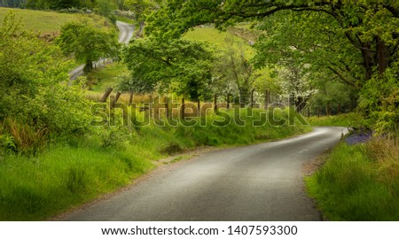 A winding Welsh country road in the Brecon Beacons, South Wales, UK
