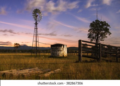 Windmill In The Countryside Of Queensland, Australia.