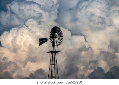 Windmill And Dramatic Clouds, Rural America