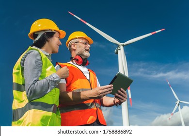 Windmill engineers inspection and progress check wind turbine - Powered by Shutterstock