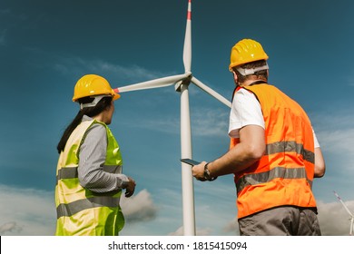 Windmill engineers inspection and progress check wind turbine