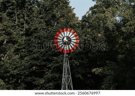 Windmill in forest, wind power, forest, trees.