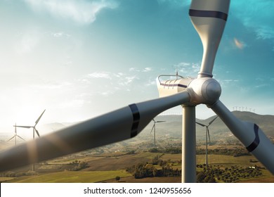 Windmill generator top wiev on the beautiful background. Sunset nature - Shutterstock ID 1240955656