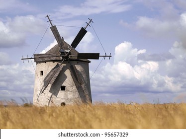 Windmill in a grain field