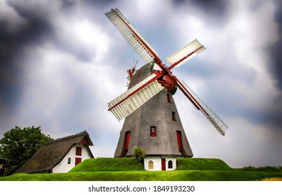 Windmill Holland farm in gloomy day