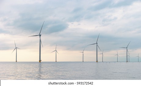 Windmill park farm offshore westermeerwind by Urk Flevoland Netherlands - Shutterstock ID 593172542