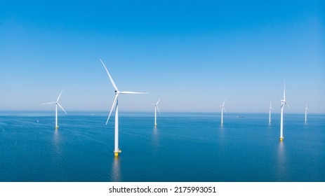 Windmill Park In The Ocean, Drone Aerial View Of Windmill Turbines Generating Green Energy Electric, Windmills Isolated At Sea In The Netherlands