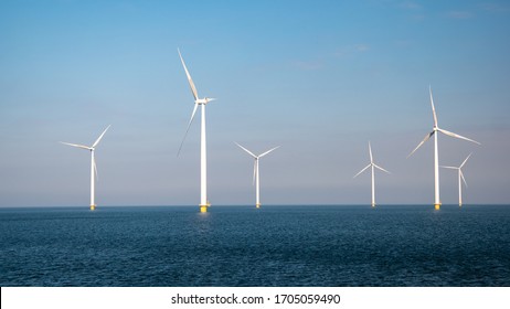 Windmill Park Westermeerdijk Netherlands, Wind Mill Turbine With Blue Sky In Ocean, Green Energy