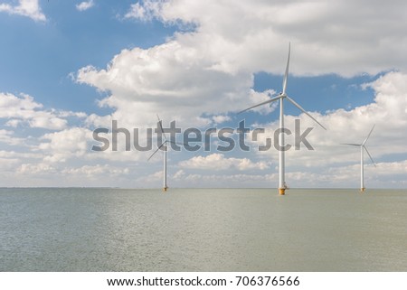 Windmill park Westermeerwind the largest wind farm offshore and on land in theNetherlands.The wind farm produce 1.4 TWh of electricity, enough electricity to over 400,000 households.Urk,Netherlands