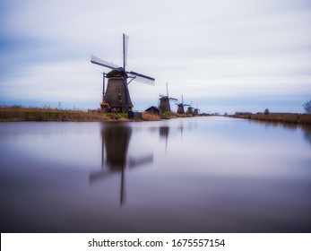 Windmill with reflection in the water