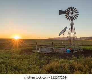 Windmill at sunset in Montana. 
