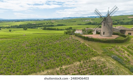 The windmill, surrounded by a setting of vines, dates from the 15th century and is classified as a historic monument. It represents the prestige of the Moulin à vent appellation in Beaujolais.