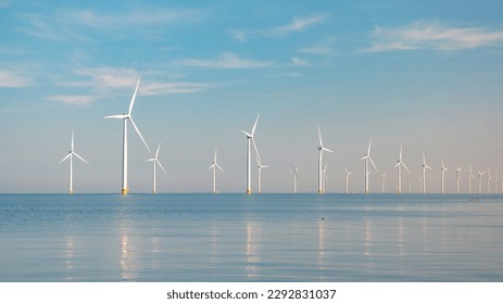 Windmill turbines Park with a blue sky, windmill turbines park in the ocean. Netherlands Europe the biggest wind park in the Netherlands - Shutterstock ID 2292831037