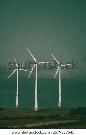 Windmill turning with sky in the background