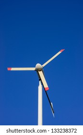 Windmill under blue sky