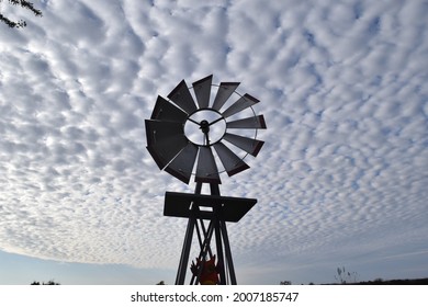 Windmill under a cloudy sky