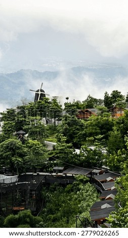 windmill and vilage in cliff view 