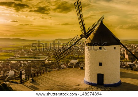 A windmill with warm colors.
