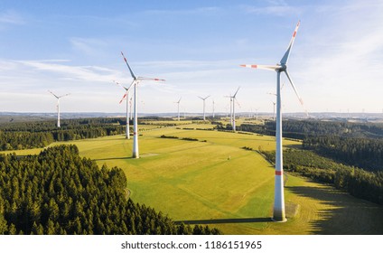 Windmills for electric power - Energy Production with clean and Renewable Energy - aerial drone shot