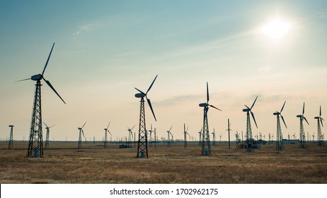 Windmills for electric power production - Shutterstock ID 1702962175