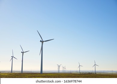Windmills for electric power production, Huesca province, Aragon in Spain. - Shutterstock ID 1636978744