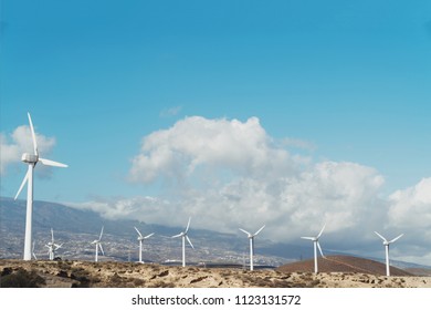 Windmills for electric power production in the mountains in Tenerife, Spain - Powered by Shutterstock