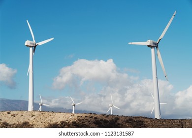 Windmills for electric power production in the mountains in Tenerife, Spain - Powered by Shutterstock