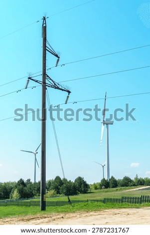 Windmills for generating clean energy. Converting wind energy into electricity.
