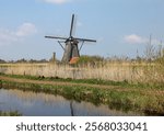 The windmills at Kinderdijk, the Netherlands, a UNESCO world heritage site. Built about 1740 system 19 windmills is part of a larger water management system to prevent flooding.