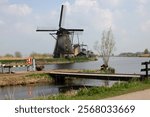 The windmills at Kinderdijk, the Netherlands, a UNESCO world heritage site. Built about 1740 system 19 windmills is part of a larger water management system to prevent flooding.