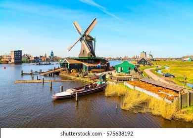 Windmills panorama in Zaanse Schans, Netherlands, Holland  traditional village, blue sky