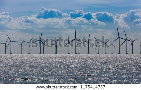 Windmills in the sea. Wind power. Green energy