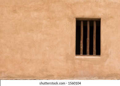 Window In Adobe Wall