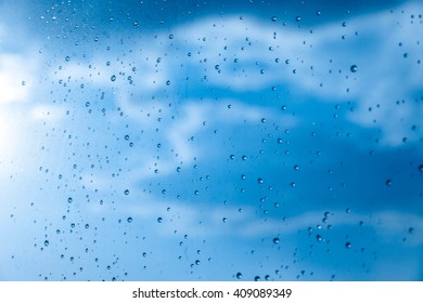 Window after rain, with sky background. 