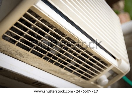 Window air conditioner unit with black mold.