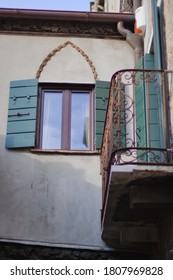 Window And Balcony Of An Extension To The Building, Bottom View, Venice. Very Small Residential Apartment