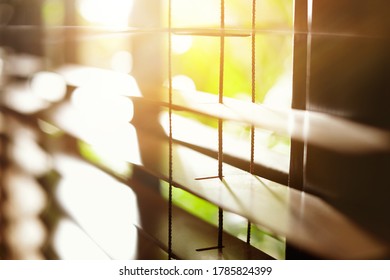 Window with blinds on sunny day, closeup - Shutterstock ID 1785824399