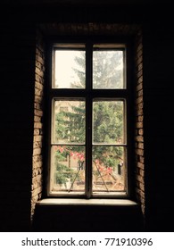 Window and a brick wall
